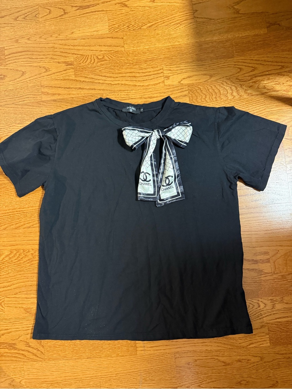 Black Short-Sleeve Tee with Decorative Bow Accent